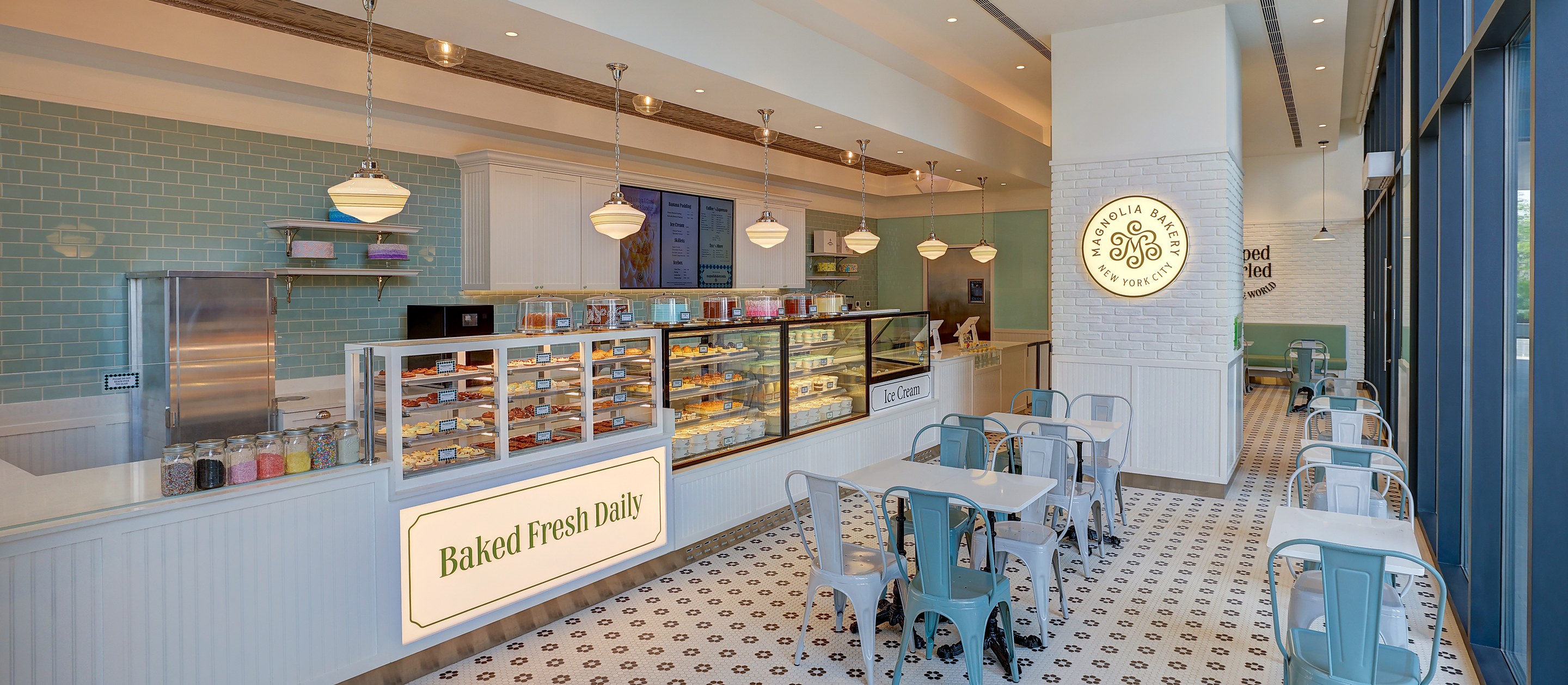 The counter and display cases inside a Magnolia Bakery store operated by Spago Foods